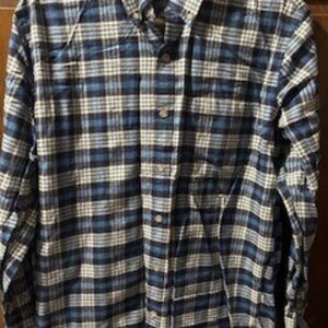 Eddie Bauer men's long-sleeve flannel shirt with a blue, white, and black plaid